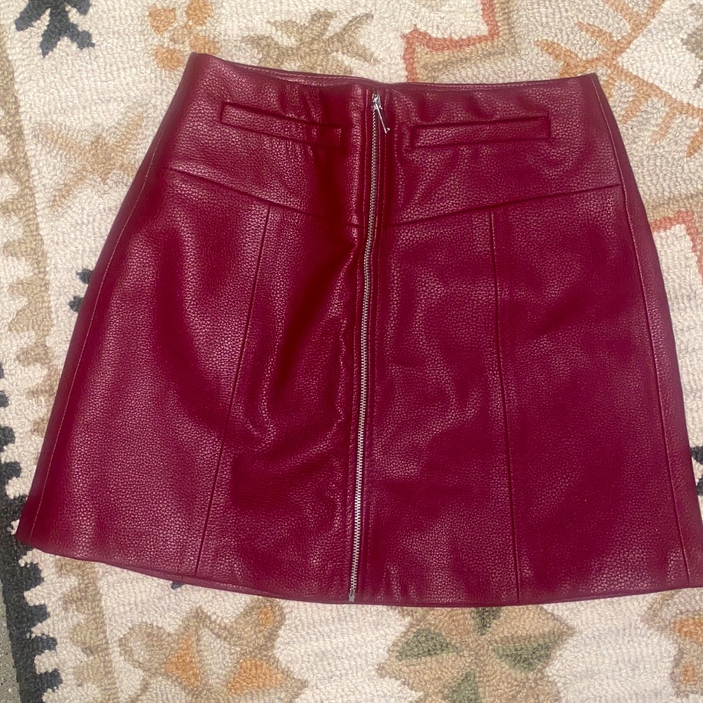 Red faux leather mini skirt